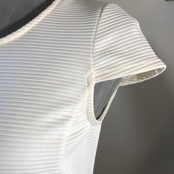 Striking Architectural Peplum Top - Picture 9 of 10